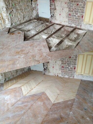 Réparation de parquet par un artisan